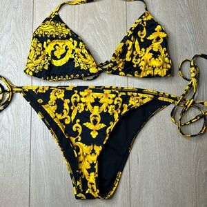 Black gold triangle strong tie bikini top and high cut cheeky bottoms